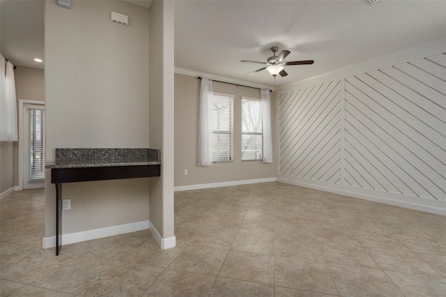 4146 Bexley Village Dr, Land O Lakes, FL 34638 - unfurnished living room featuring a ceiling fan, ornamental molding, and light tile patterned flooring