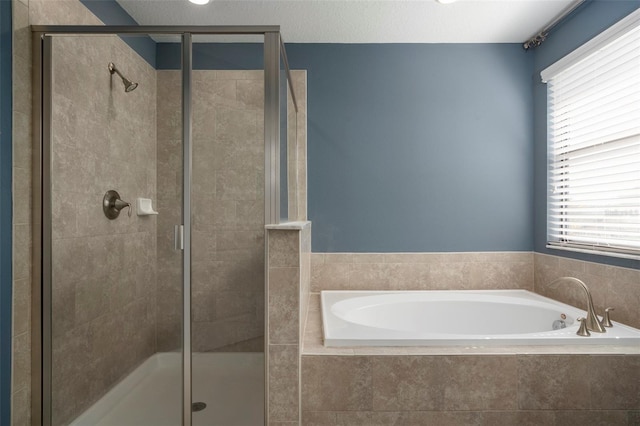 4146 Bexley Village Dr, Land O Lakes, FL 34638 - bathroom with a garden tub, a shower stall, and healthy amount of natural light
