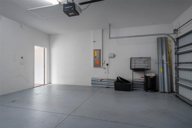4146 Bexley Village Dr, Land O Lakes, FL 34638 - garage featuring a garage door opener, electric panel, and concrete block wall
