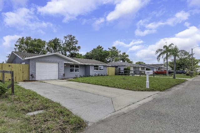 7625 Marechal Ave, Port Richey, FL 34668 - ranch-style house with a garage and concrete driveway