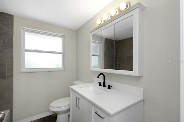 7625 Marechal Ave, Port Richey, FL 34668 - bathroom featuring vanity and toilet
