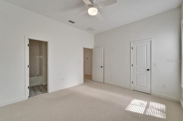 5205 Brighton Shore Dr, Apollo Beach, FL 33572 - unfurnished bedroom featuring carpet floors and connected bathroom