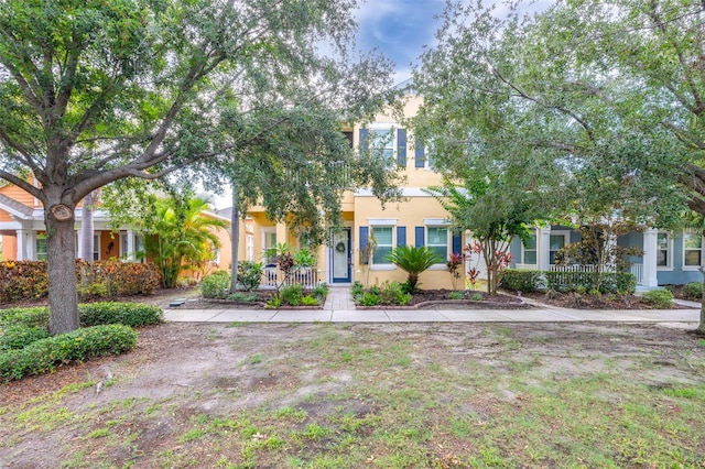 511 Winterside Dr, Apollo Beach, FL 33572 - view of property hidden behind natural elements with stucco siding