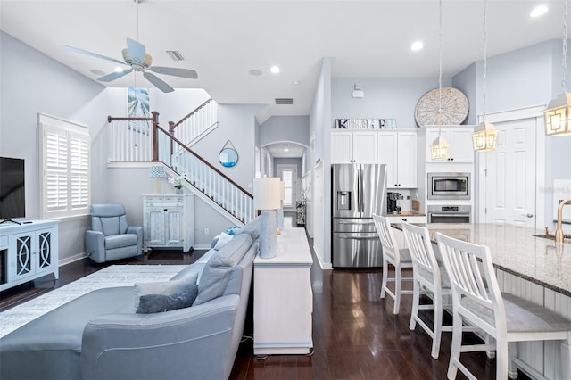 511 Winterside Dr, Apollo Beach, FL 33572 - living area with stairs, ceiling fan, dark wood finished floors, plenty of natural light, and recessed lighting