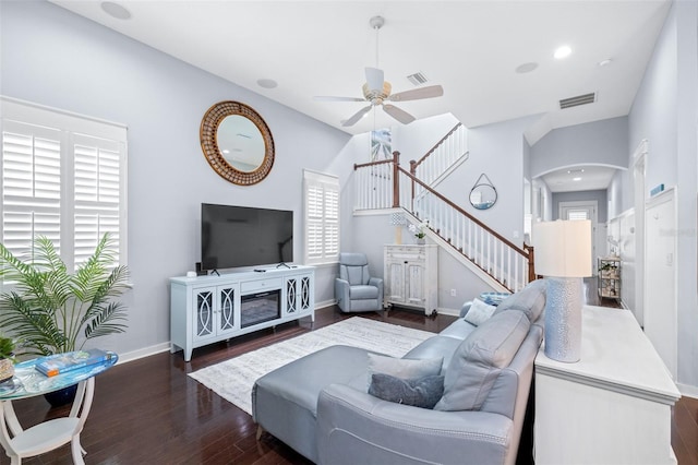 511 Winterside Dr, Apollo Beach, FL 33572 - living area with a ceiling fan, stairway, wood finished floors, and arched walkways