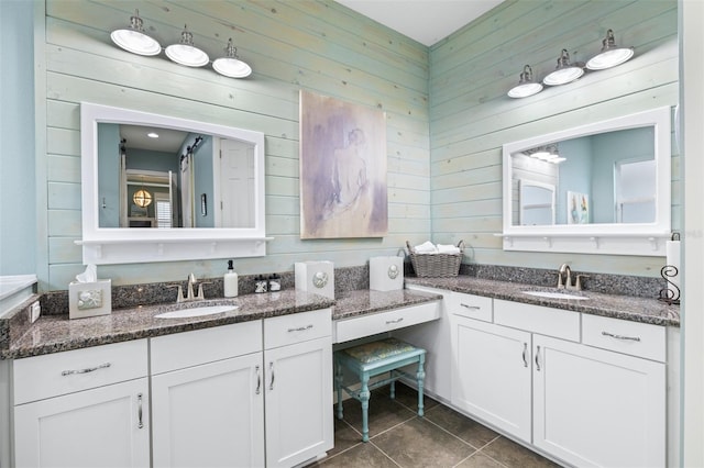 511 Winterside Dr, Apollo Beach, FL 33572 - full bath featuring wooden walls, tile patterned flooring, and vanity