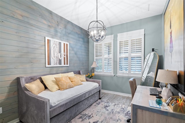 511 Winterside Dr, Apollo Beach, FL 33572 - office area with wood finished floors, a chandelier, and wooden walls