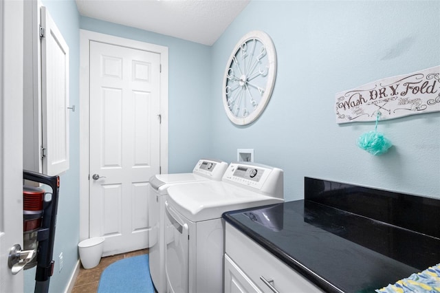 511 Winterside Dr, Apollo Beach, FL 33572 - washroom with washer and dryer, cabinet space, and tile patterned floors