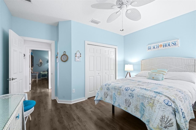 511 Winterside Dr, Apollo Beach, FL 33572 - bedroom with dark wood-type flooring, a closet, and a ceiling fan