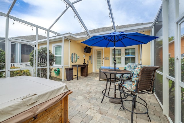 511 Winterside Dr, Apollo Beach, FL 33572 - sunroom / solarium with a jacuzzi and outdoor dining area