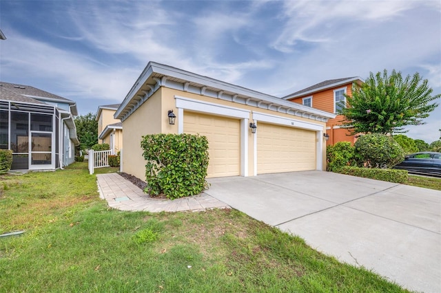 511 Winterside Dr, Apollo Beach, FL 33572 - view of side of property featuring driveway, a garage, and stucco siding