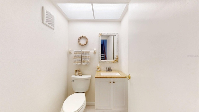 12132 Capri Cir S, Treasure Island, FL 33706 - half bathroom featuring toilet and vanity