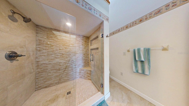 12132 Capri Cir S, Treasure Island, FL 33706 - bathroom with a stall shower and tile patterned flooring