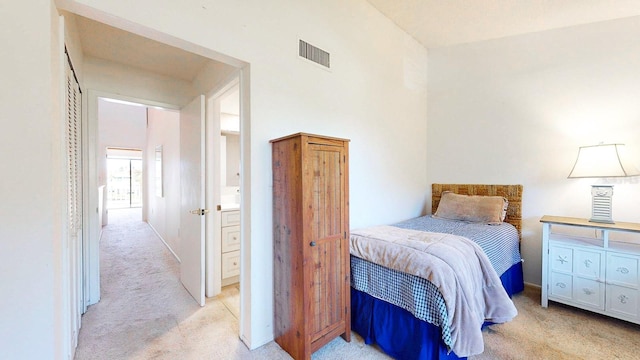 12132 Capri Cir S, Treasure Island, FL 33706 - bedroom with light carpet