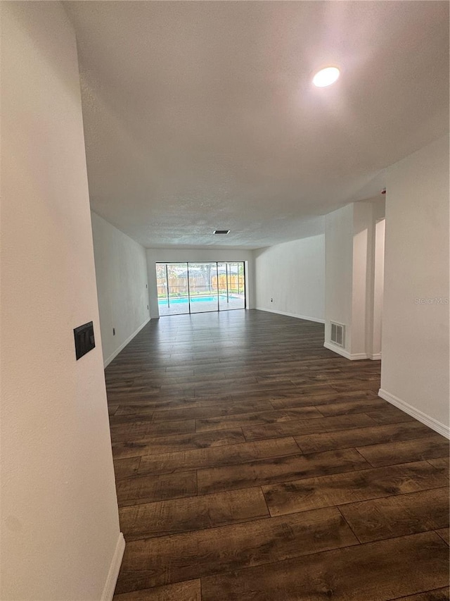 2102 Doefield Ct, Valrico, FL 33596 - empty room with dark wood finished floors