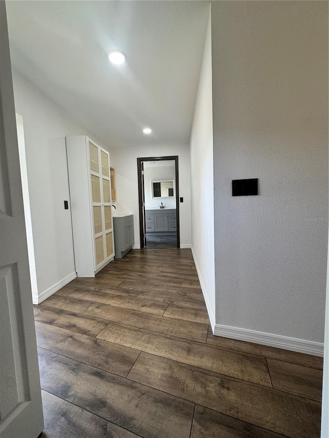 2102 Doefield Ct, Valrico, FL 33596 - hallway featuring dark wood-style flooring and recessed lighting