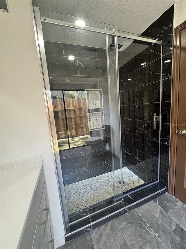 2102 Doefield Ct, Valrico, FL 33596 - bathroom featuring a stall shower, vanity, and marble finish floors