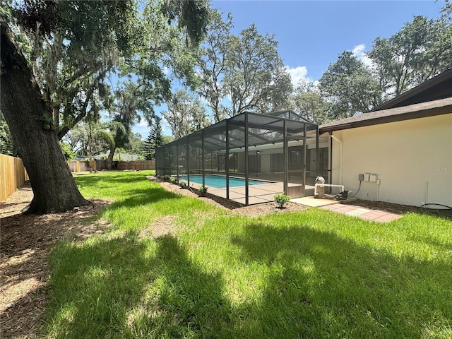 2102 Doefield Ct, Valrico, FL 33596 - fenced backyard featuring a lanai