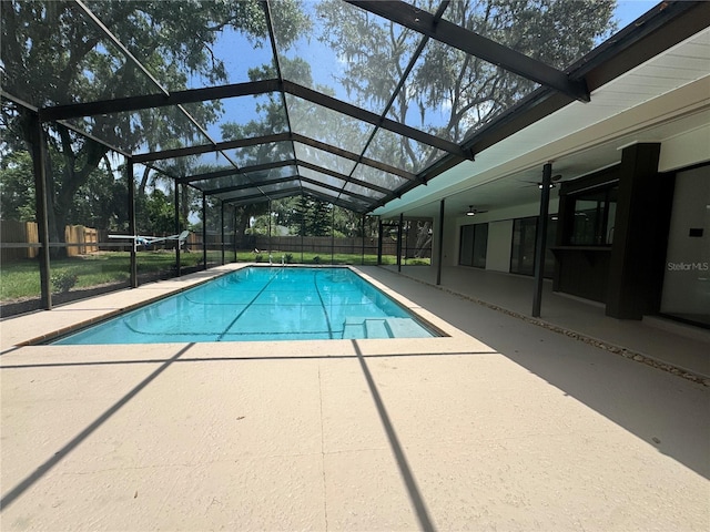 2102 Doefield Ct, Valrico, FL 33596 - view of pool featuring a patio area, ceiling fan, and glass enclosure