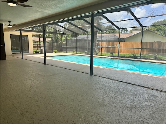2102 Doefield Ct, Valrico, FL 33596 - view of pool with a fenced backyard, a patio, ceiling fan, and a lanai