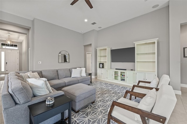 7114 Bowspirit Pl, Apollo Beach, FL 33572 - tiled living room with ceiling fan, a high ceiling, and recessed lighting