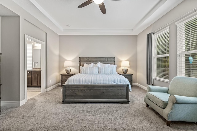 7114 Bowspirit Pl, Apollo Beach, FL 33572 - bedroom featuring carpet, a raised ceiling, and ensuite bath