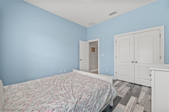 7114 Bowspirit Pl, Apollo Beach, FL 33572 - bedroom with wood finished floors and a closet