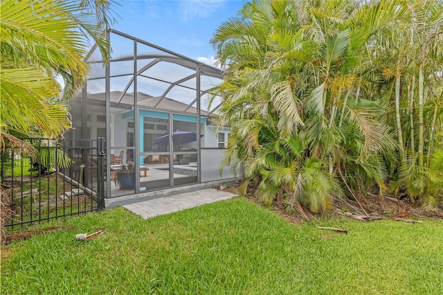 7114 Bowspirit Pl, Apollo Beach, FL 33572 - view of green lawn featuring a lanai