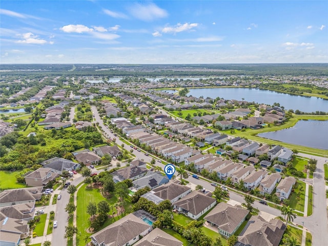 7114 Bowspirit Pl, Apollo Beach, FL 33572 - aerial overview of property's location featuring nearby suburban area and a large body of water