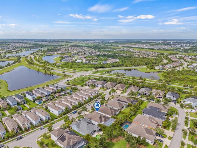 7114 Bowspirit Pl, Apollo Beach, FL 33572 - aerial overview of property's location with nearby suburban area and a nearby body of water