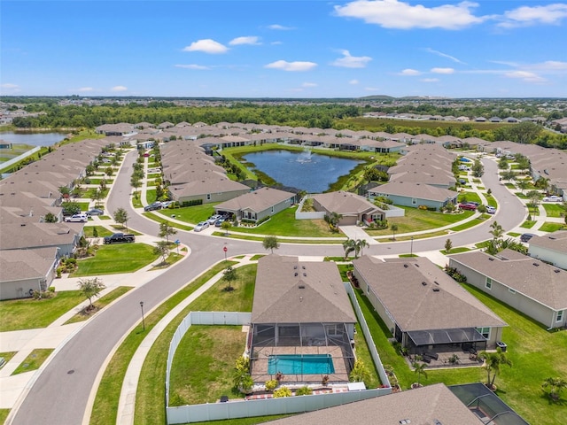 13301 Waterleaf Garden Cir, Riverview, FL 33579 - aerial perspective of suburban area with a nearby body of water and a pool area