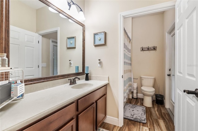 165 Mobbly Bay Dr, Oldsmar, FL 34677 - full bathroom featuring wood finished floors, vanity, and a shower with curtain