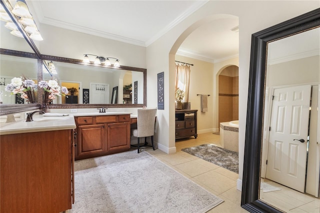 165 Mobbly Bay Dr, Oldsmar, FL 34677 - bathroom featuring vanity, tile patterned flooring, crown molding, and a bathtub