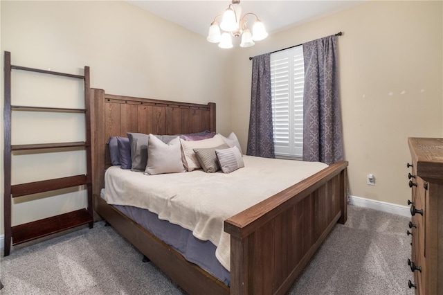 165 Mobbly Bay Dr, Oldsmar, FL 34677 - carpeted bedroom with baseboards and a chandelier