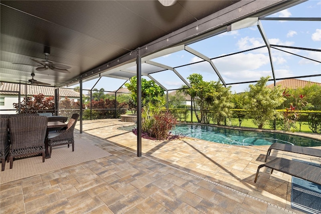 165 Mobbly Bay Dr, Oldsmar, FL 34677 - swimming pool with a patio, ceiling fan, and a lanai
