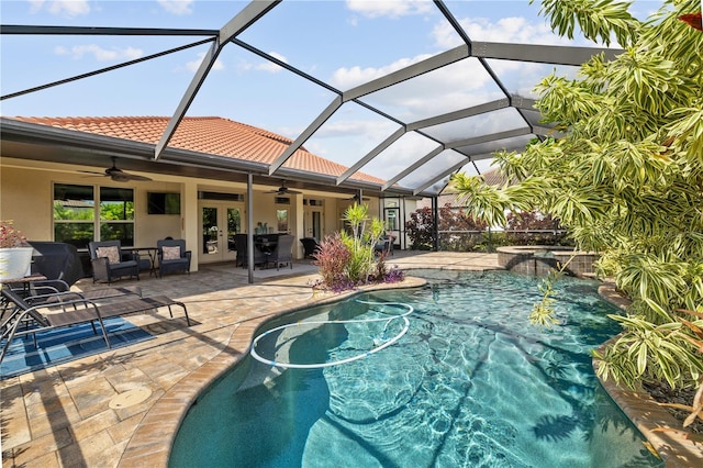 165 Mobbly Bay Dr, Oldsmar, FL 34677 - view of pool with french doors, ceiling fan, a patio area, a pool with connected hot tub, and a lanai