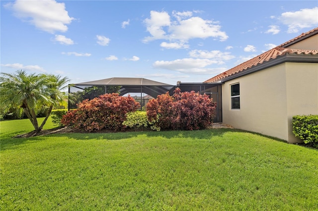 165 Mobbly Bay Dr, Oldsmar, FL 34677 - view of grassy yard featuring glass enclosure
