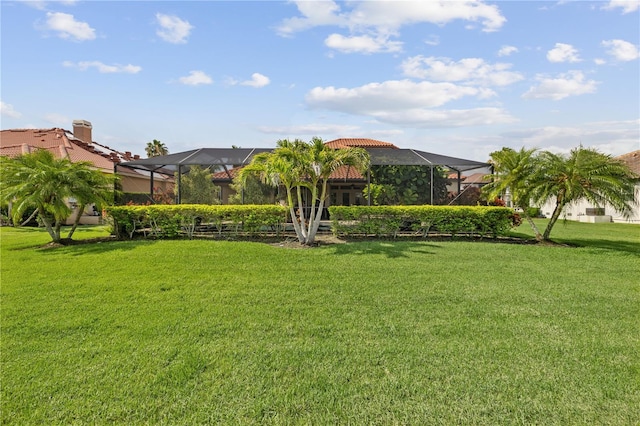 165 Mobbly Bay Dr, Oldsmar, FL 34677 - view of green lawn featuring a lanai