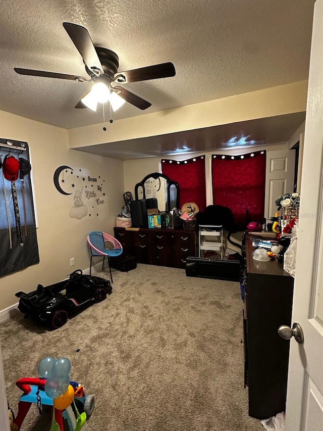 701 N 7th St, Haines City, FL 33844 - carpeted bedroom with a textured ceiling and ceiling fan