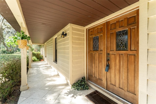 11307 Sandpine Rd, Riverview, FL 33569 - view of exterior entry with a porch