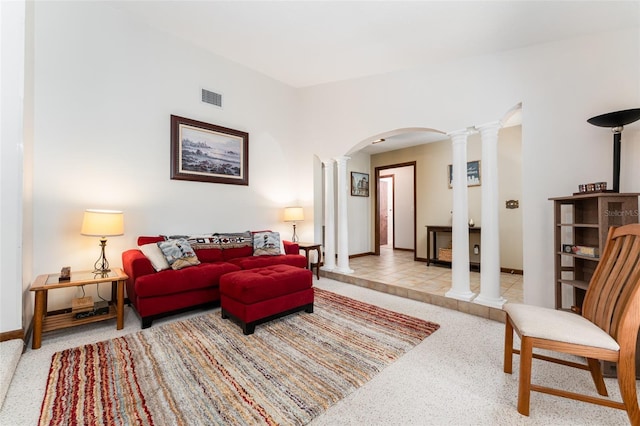 11307 Sandpine Rd, Riverview, FL 33569 - carpeted living room featuring ornate columns and arched walkways