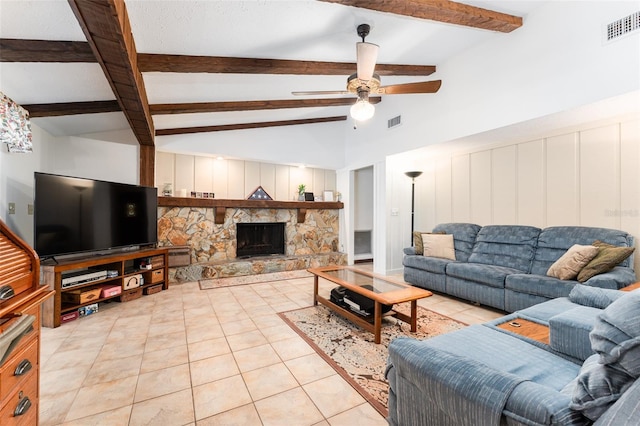 11307 Sandpine Rd, Riverview, FL 33569 - living room featuring light tile patterned floors, ceiling fan, and a fireplace