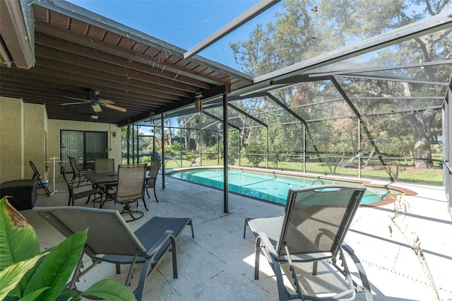 11307 Sandpine Rd, Riverview, FL 33569 - outdoor pool with a patio area, ceiling fan, a lanai, and outdoor dining space