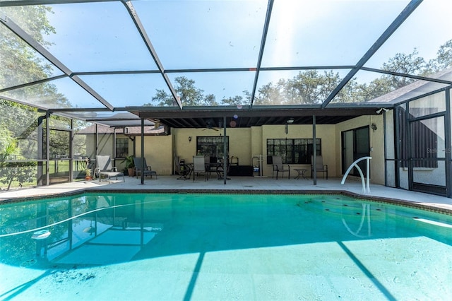 11307 Sandpine Rd, Riverview, FL 33569 - swimming pool featuring a patio, glass enclosure, and ceiling fan