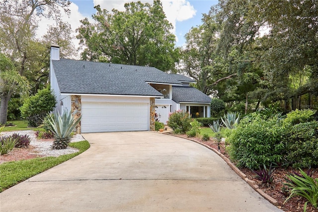 15917 Dover Cliffe Dr, Lutz, FL 33548 - mid-century home with roof with shingles, stone siding, driveway, a garage, and a chimney