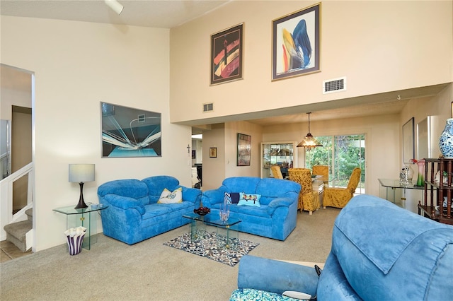 15917 Dover Cliffe Dr, Lutz, FL 33548 - carpeted living room with a high ceiling and stairway