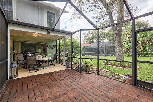 15917 Dover Cliffe Dr, Lutz, FL 33548 - unfurnished sunroom with outdoor dining space