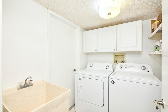 15917 Dover Cliffe Dr, Lutz, FL 33548 - washroom with independent washer and dryer, a textured ceiling, and cabinet space