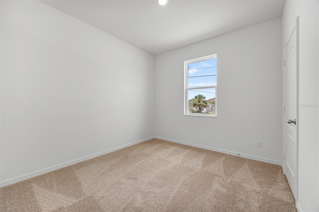 247 Big Sioux Dr, Poinciana, FL 34759 - unfurnished room featuring light colored carpet and baseboards