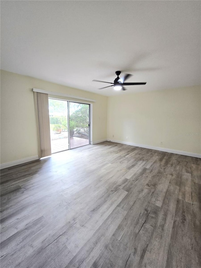 8300 Bardmoor Blvd Unit 110, Seminole, FL 33777 - spare room featuring wood finished floors and a ceiling fan
